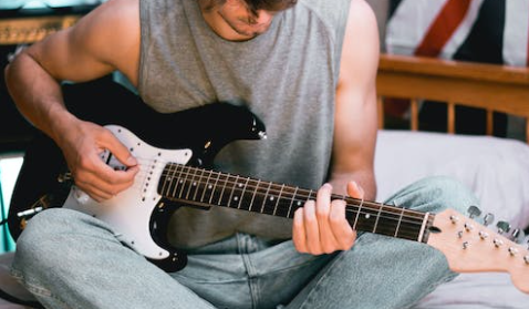 What's the difference between learning to play acoustic and electric guitar?