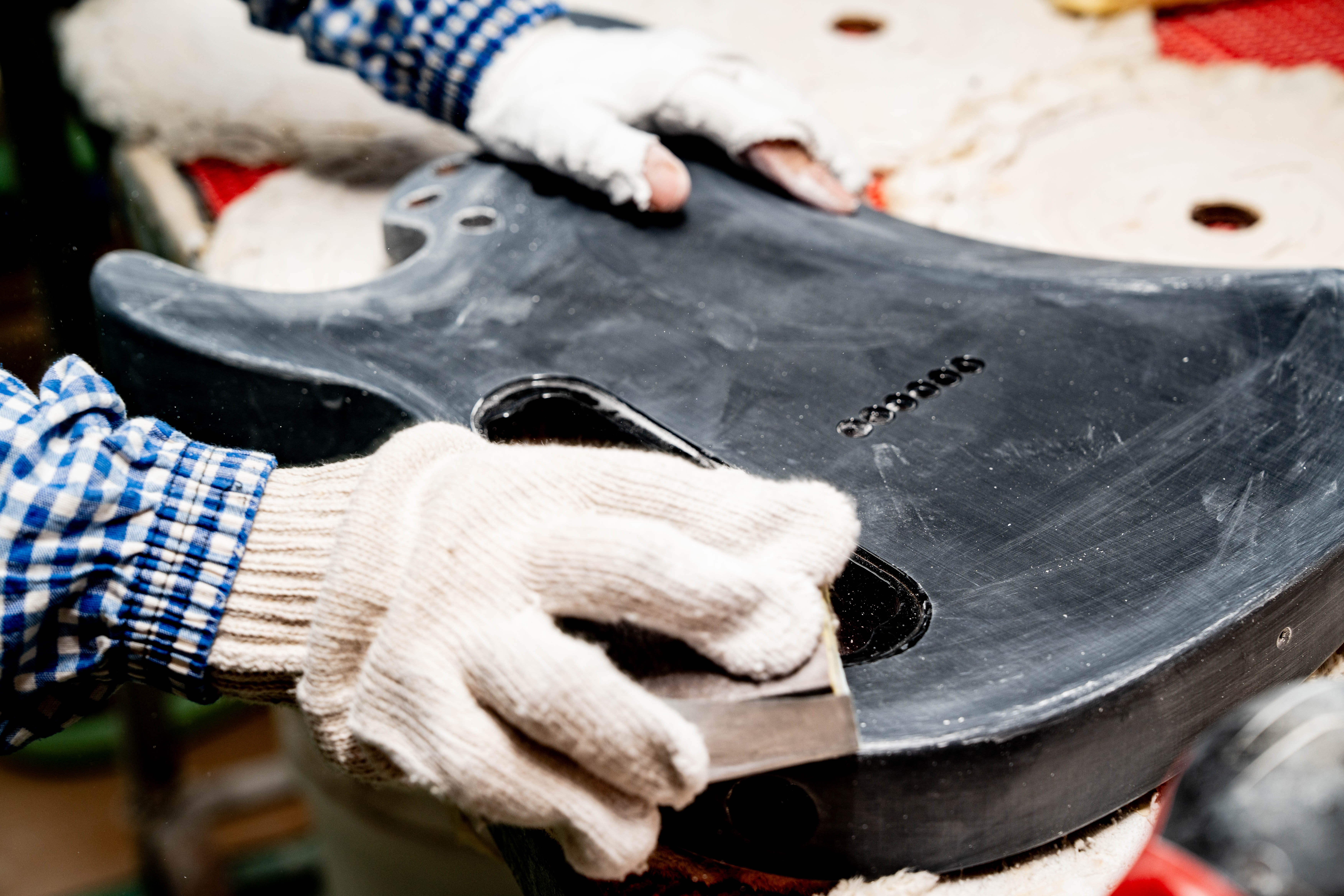 Guitar body being prepared during production